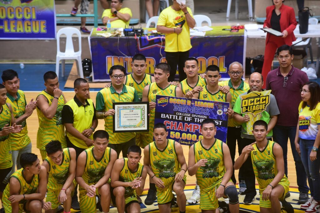 St. Joseph College of Maasin (SJC) Green Hawks pose for a group photo at center court in Ormoc Superdome during the awarding ceremony of the OCCCI D-League Interschool Basketball Tournament : Battle of the Best. | Photo from OCCCI D-League