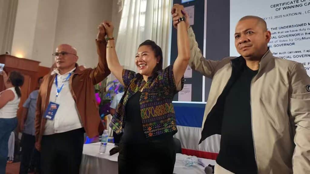 WINNING SMILE Pamela “Pam” Baricuatro (center), a political neophyte, is officially proclaimed winner of Cebu’s gubernatorial race by the provincial board of canvassers on Tuesday afternoon at the Cebu provincial capitol, defeating reelectionist Gov. Gwendolyn “Gwen” Garcia. —Nestle Semilla-Dakay